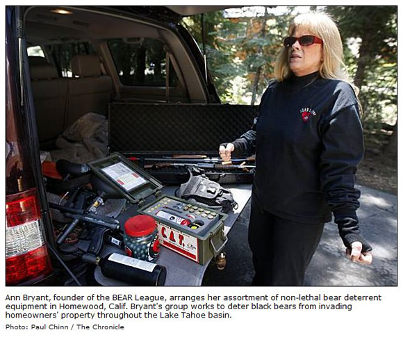 Ann Bryant with non-lethal bear deterrent equipment
